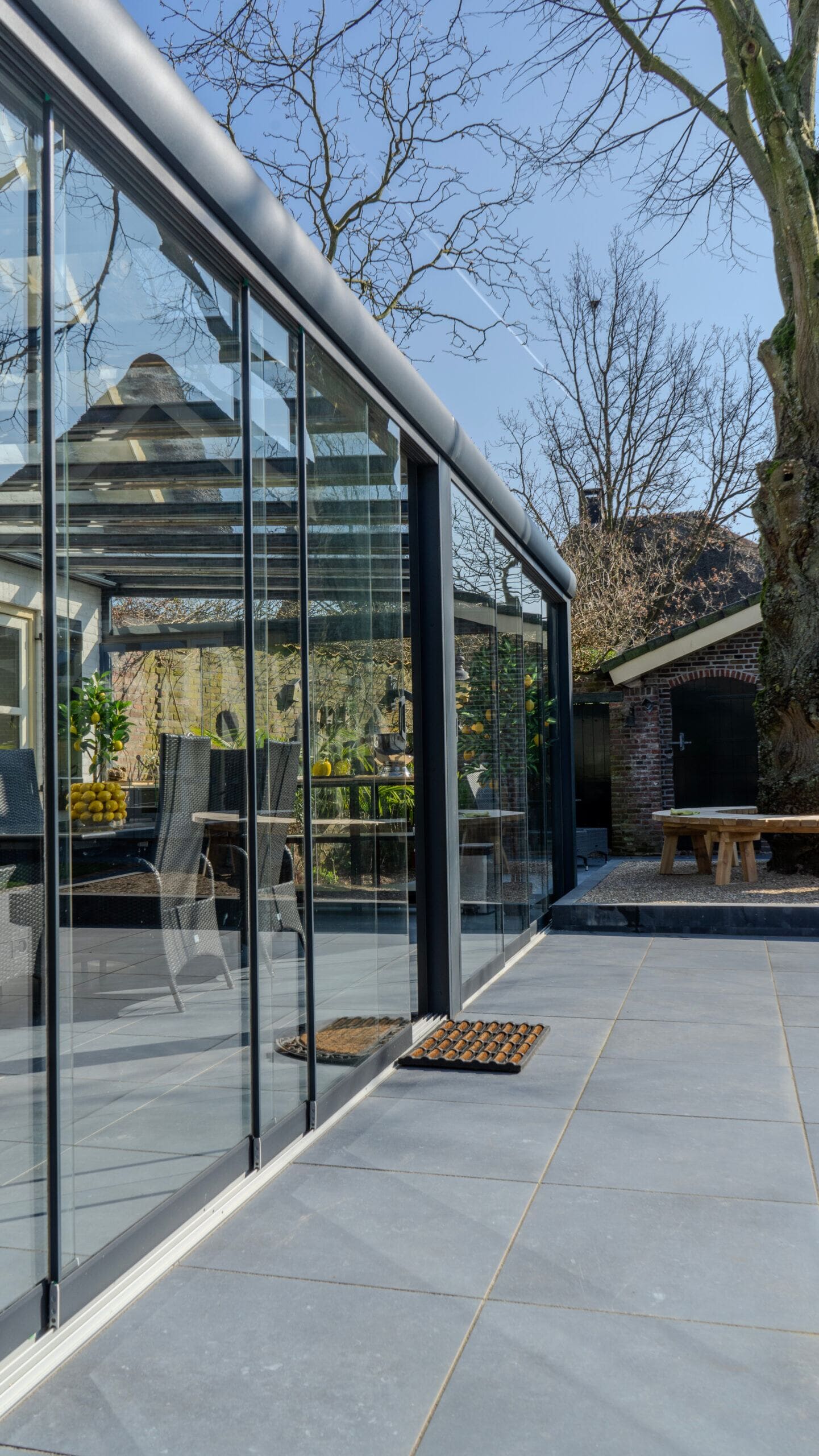 Glazen schuifwanden veranda