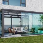 Zwarte serre met glazen schuifwanden 4 rails