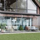 Zwarte serre met glazen schuifwanden 7 rails